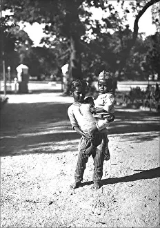 Sibling: Two young children, India
