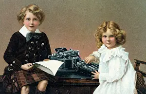 Yost: Two young children using a Yost brand typewriter