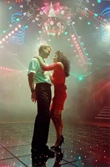 Dancefloor: Young couple at a disco, Cornwall