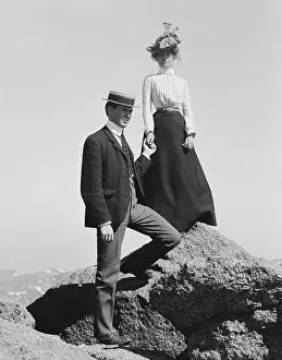 Lcgr1803: Young couple holding hands while posed on