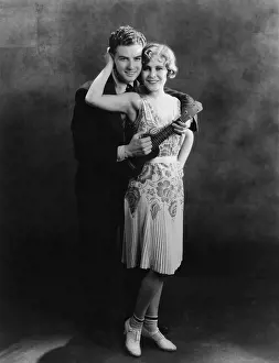 Ukulele: Young couple hugging