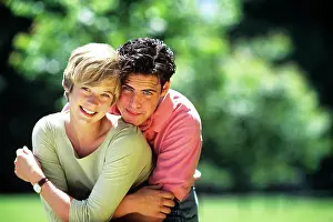 Deg002: Young Couple Outdoors Looking at Camera Brunette Man