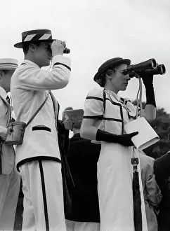 Regattas: Young couple at a sailing regatta