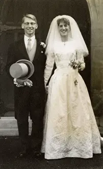 Brocade: Young couple in wedding costume