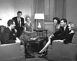 Snacks: Three young couples nicely dressed sitting around talking