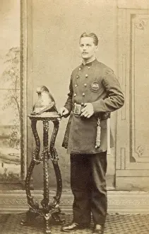 Pickering: Young fireman in studio photograph