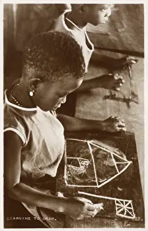 Ghanaian: Young Ghanaian girl learning to draw