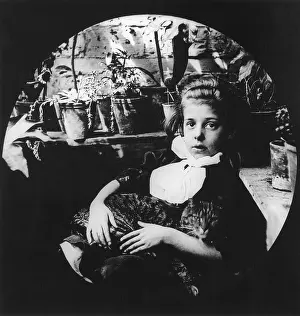 Tomcat: A Young Girl with Cat