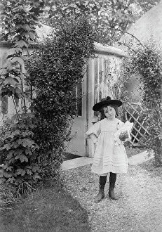 Summerhouse: YOUNG GIRL IN GARDEN
