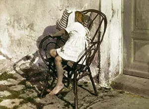 Shyness: A young girl is hiding her face