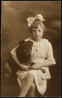 Bobbed: YOUNG GIRL AND PET DOG