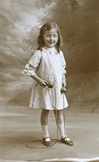 Skip: Young girl with a skipping rope