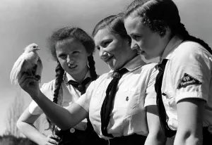 Chicks: Young girls with chicks, 1938