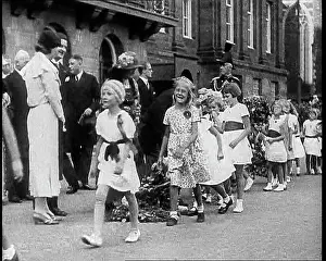 Young Girls Leaving Flowers in a Pile for Wilhelmina