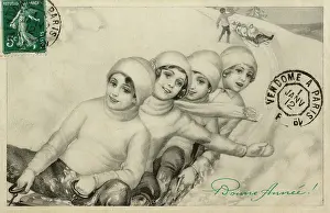 Sledging: Four young girls tobogganing
