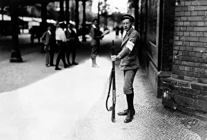 Controlling: Young guard at a railway crossing, 1914