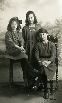 Lucinda Moore: Three young ladies pose for a formal studio portrait