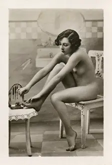 Trims: Young Lady doing a pedicure on herself