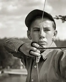 Disciplined: Serious Young Man Boy at Summer Camp Drawing and