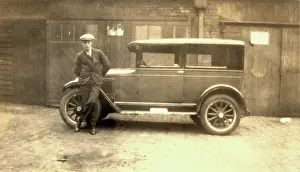 Garages: Young man and his car