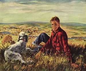 Leisurely: Young Man with Dog on Hillside
