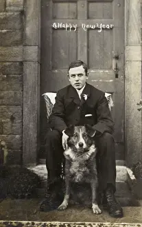 Buttonhole: Young man with dog outside a building