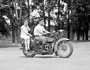 1405history: A young man drives a motorcycle