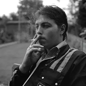 Tony Boxallfrps: Young man smoking a cigarette