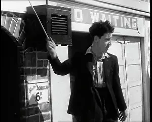 Admission: A Young Man in a Suit With an Open-Necked Shirt