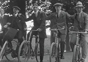 Chums: Five young men on their bicycles