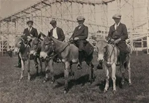 Coaster: Young men on donkeys, original caption: ?