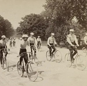 Sweaters: Ten young men riding bicycles in New York