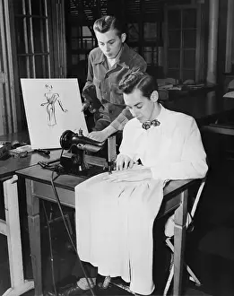 Collaborate: Young men using sewing machine