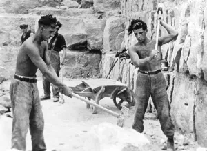 Topless: Young men working in a quarry, 1939