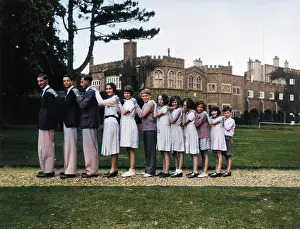 Smallest: Twelve young people standing in a line