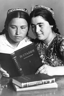 Uzbekistan: Young Uzbeks reading about Stalin