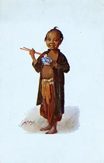 Chopsticks: Young Vietnamese boy with his bowl of rice