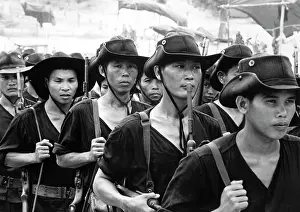 Vietnamese: Young Vietnamese men return to their native