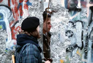 Glasnost: A young West German woman speaks with an ?