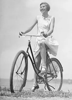 Hobby: Young woman on bicycle, 1936