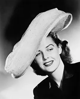 Close Ups: Young woman with a big white hat