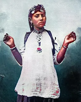 Castanets: Young woman with castanets, Egypt
