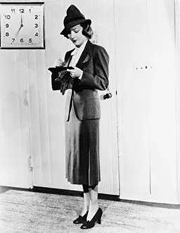 Fortunate: Young woman checking her purse