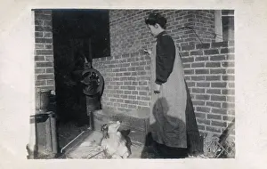 Mangle: Young woman and dog in back yard