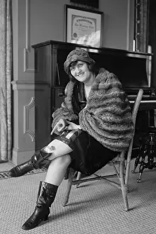 20 30 Years Old: Young woman hiding a flask in her high boot, during