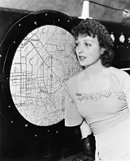 Graph: Young woman looking at a radar