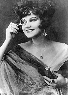 Brooch: Young woman with lorgnette, 20s
