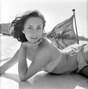 Windswept: Young woman modelling on a boat