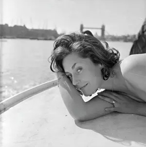 Windswept: Young woman modelling on a boat