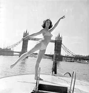 Windswept: Young woman modelling on a boat
